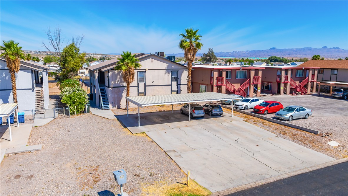 793 Baseline Road Bullhead City, AZ 86442 - Photo 41 of 49 Multi-building property featuring a central paved parking area with covered carports
