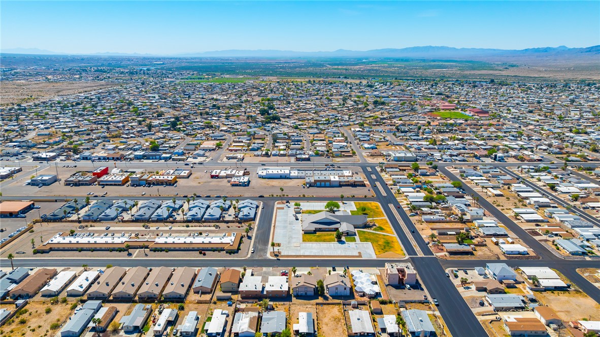 793 Baseline Road Bullhead City, AZ 86442 - Photo 46 of 49 Aerial perspective showcasing a residential community with various property types