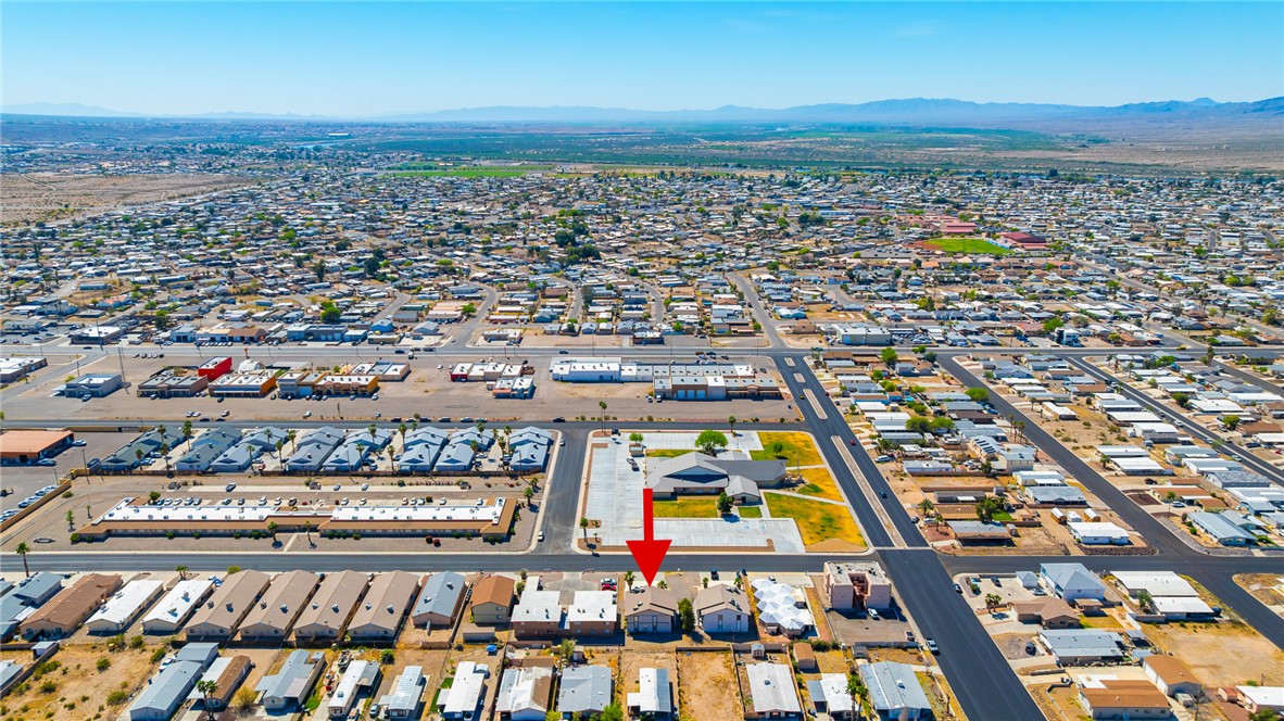 793 Baseline Road Bullhead City, AZ 86442 - Photo 49 of 49 Aerial perspective showcasing a residential neighborhood with a mix of housing types