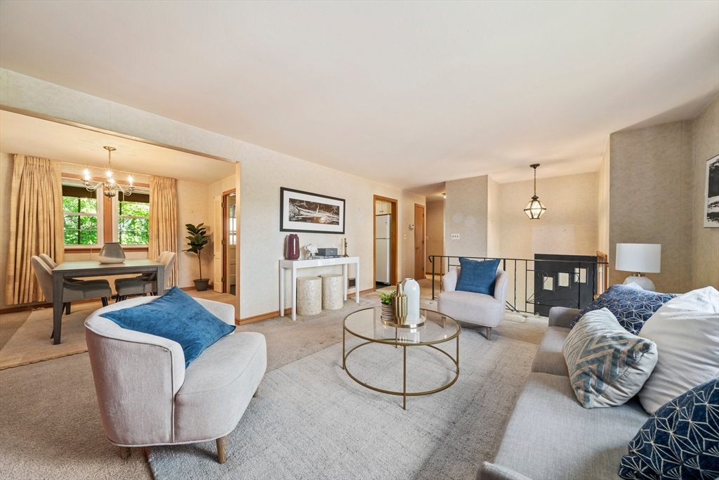 129 Devon Road Norwood, MA 02062 - Photo 12 of 32 a living room with furniture and a large window