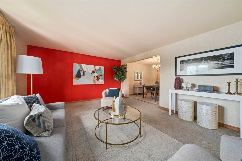 129 Devon Road Norwood, MA 02062 - Photo 14 of 32 a living room with furniture and a table