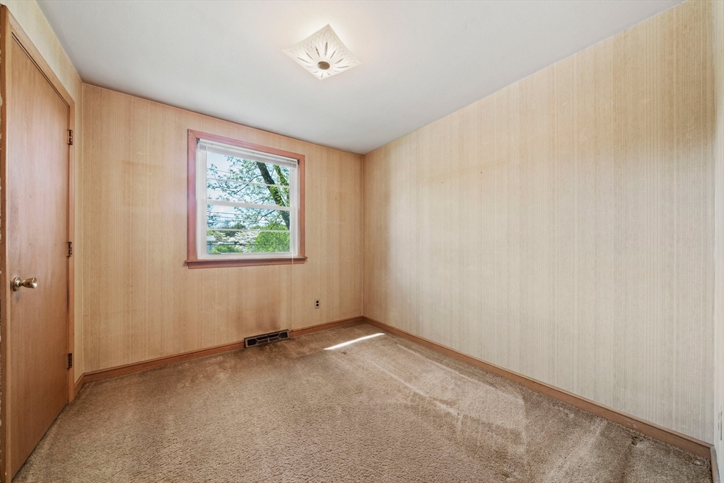 129 Devon Road Norwood, MA 02062 - Photo 17 of 32 an empty room with windows