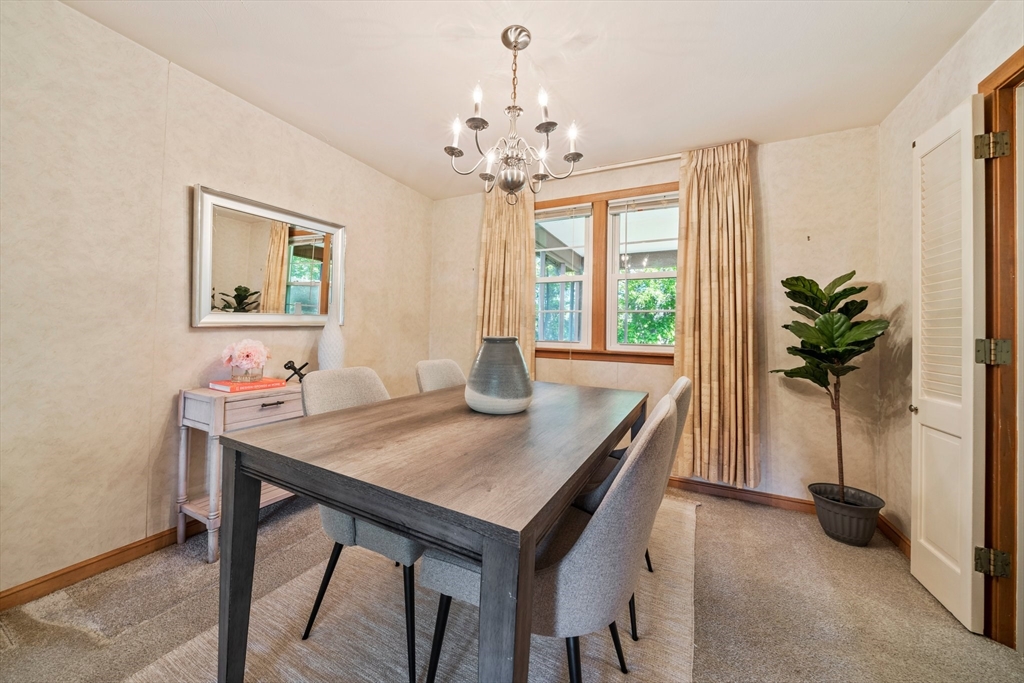 129 Devon Road Norwood, MA 02062 - Photo 9 of 32 a view of a dining room with furniture window and wooden floor