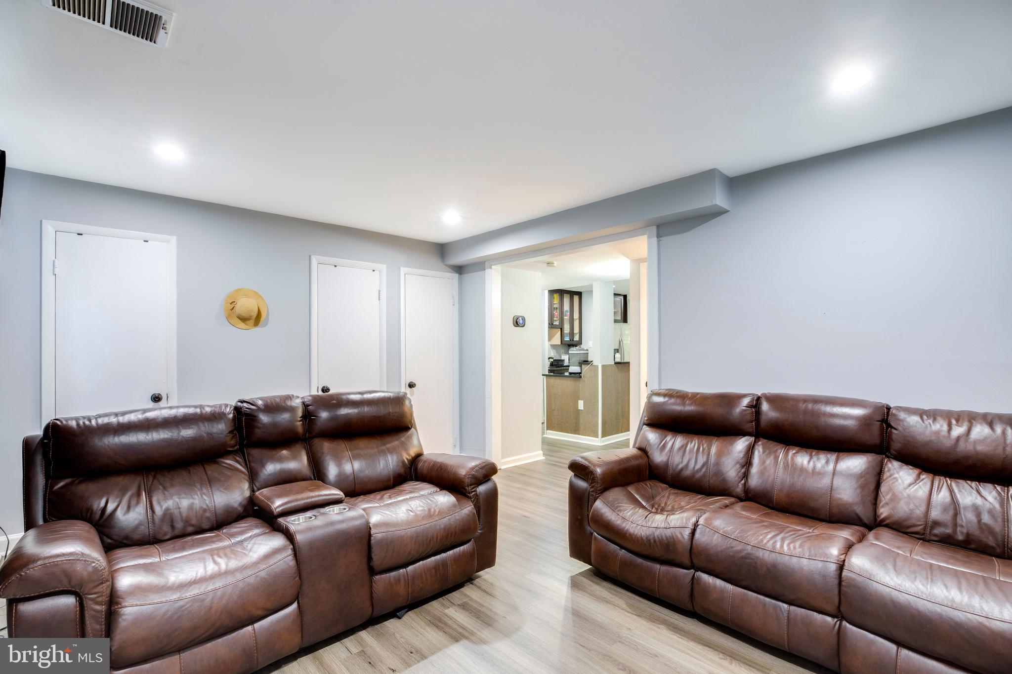 3382 Hewitt Avenue, Unit 102 Silver Spring, MD 20906 - Photo 5 of 22 a living room with furniture and a couch