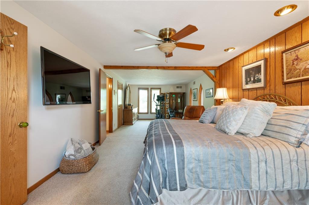 323 Wolfe Lane Irwin, PA 15642 - Photo 12 of 29 a bed room with a bed and a television