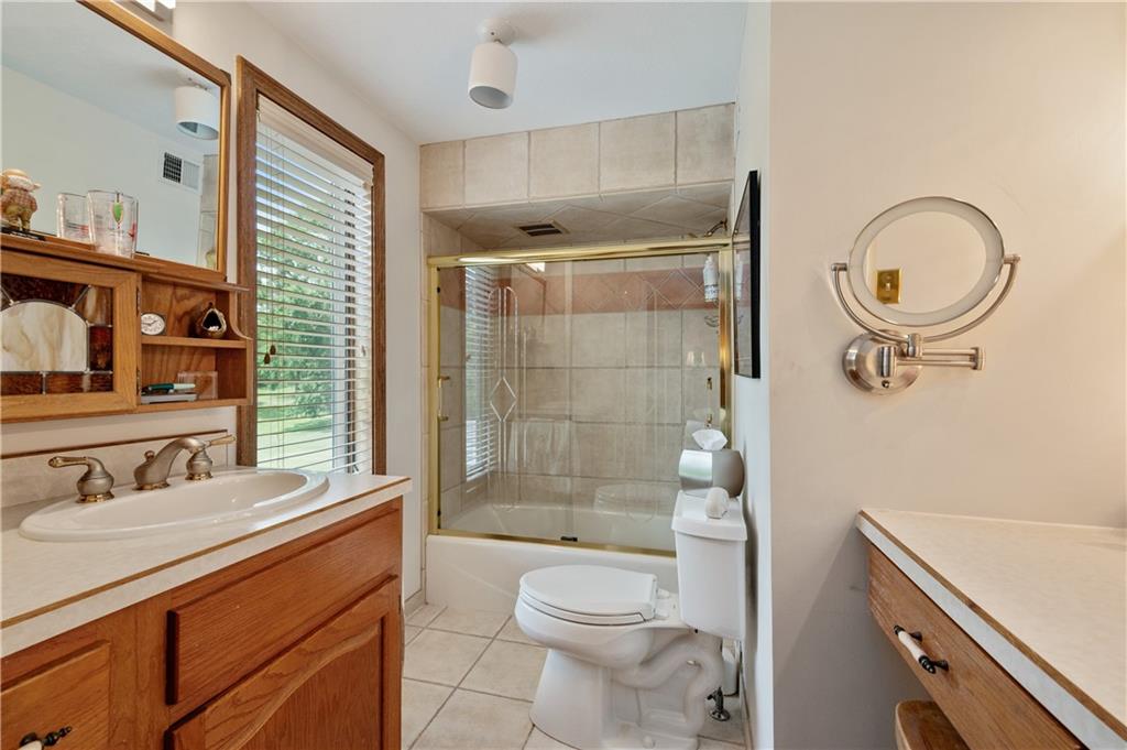 323 Wolfe Lane Irwin, PA 15642 - Photo 14 of 29 a bathroom with a sink a toilet and shower