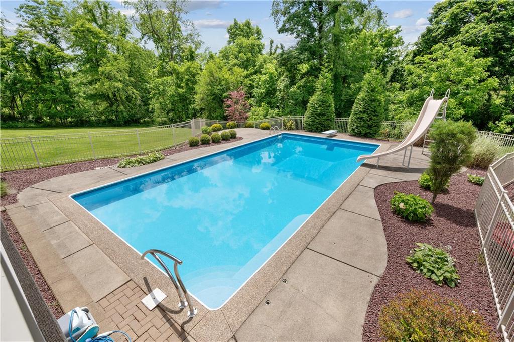 323 Wolfe Lane Irwin, PA 15642 - Photo 21 of 29 a view of a backyard with swimming pool