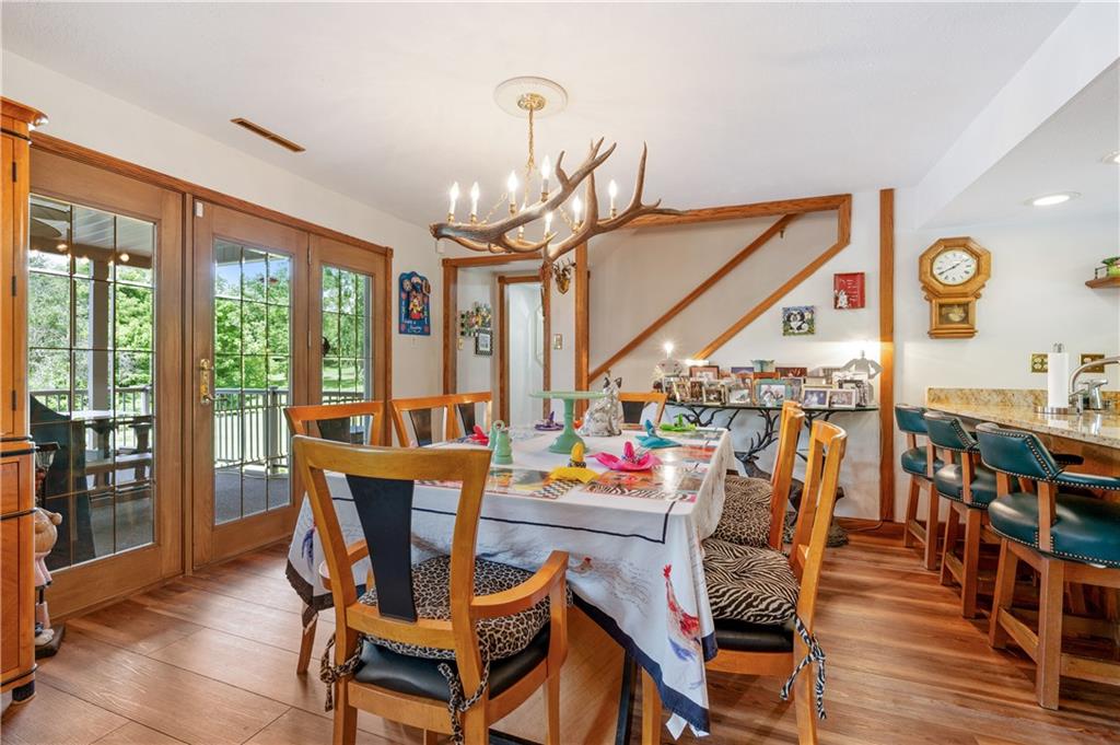 323 Wolfe Lane Irwin, PA 15642 - Photo 5 of 29 a view of a dining room with furniture window and outside view