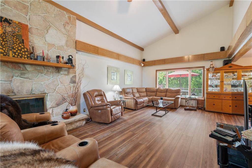 323 Wolfe Lane Irwin, PA 15642 - Photo 9 of 29 a living room with furniture and a fireplace
