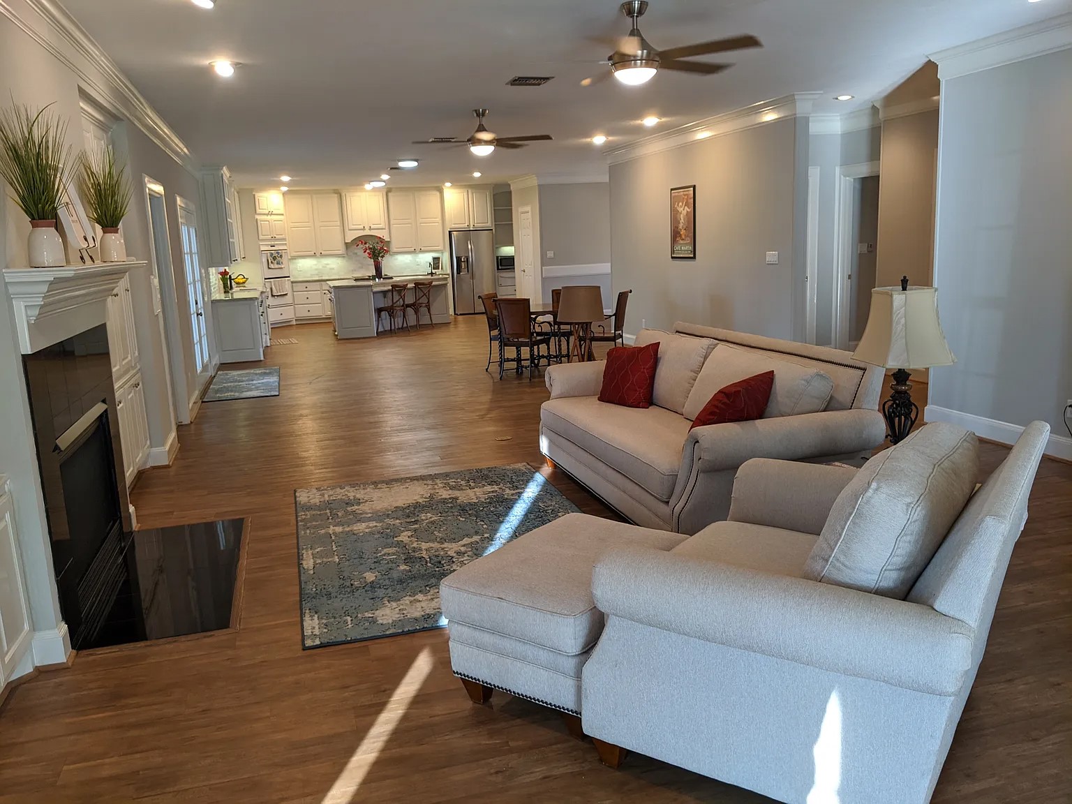 4309 Bowser Road Fulshear, TX 77441 - Photo 14 of 20 a living room with furniture and a fireplace