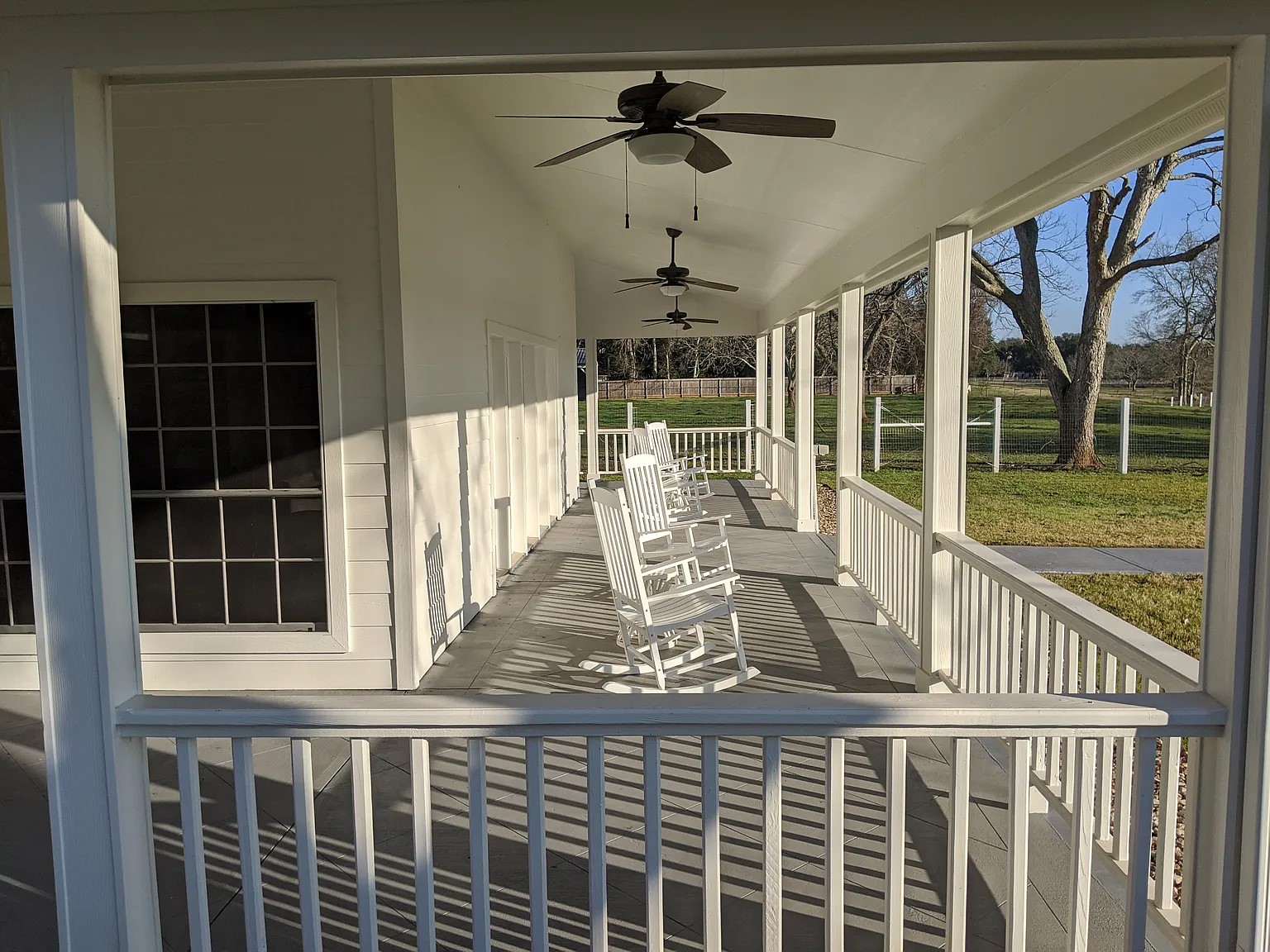 4309 Bowser Road Fulshear, TX 77441 - Photo 17 of 20 a view of a house with a porch