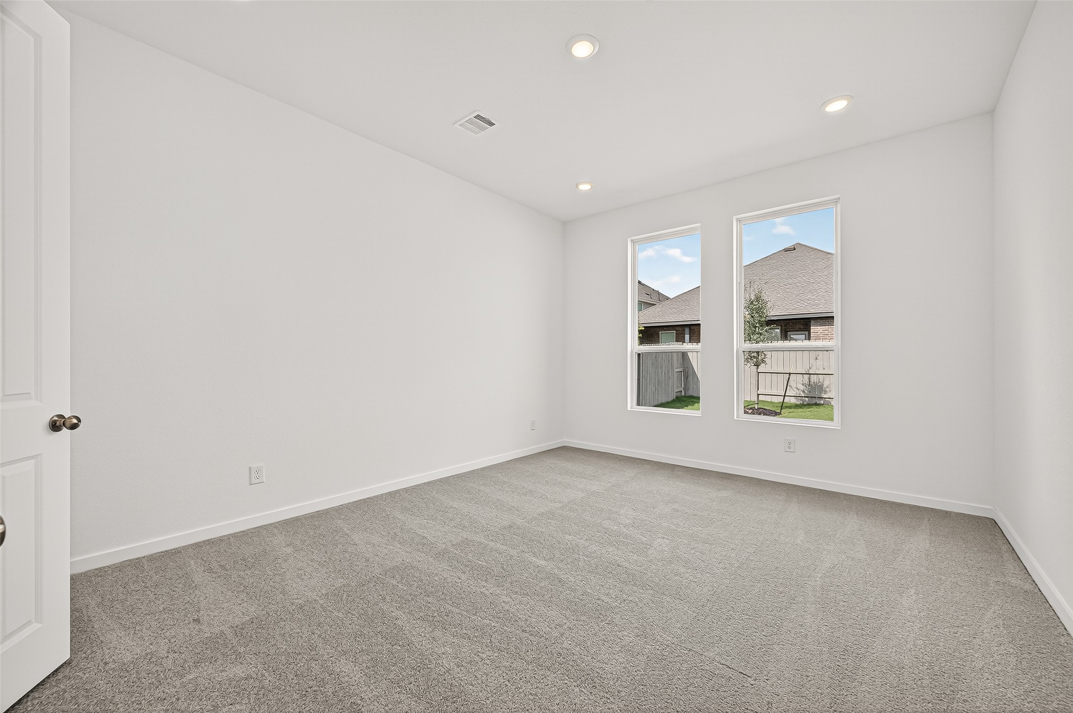 2419 Hazel Berry Street Manvel, TX 77578 - Photo 24 of 50 an empty room with windows