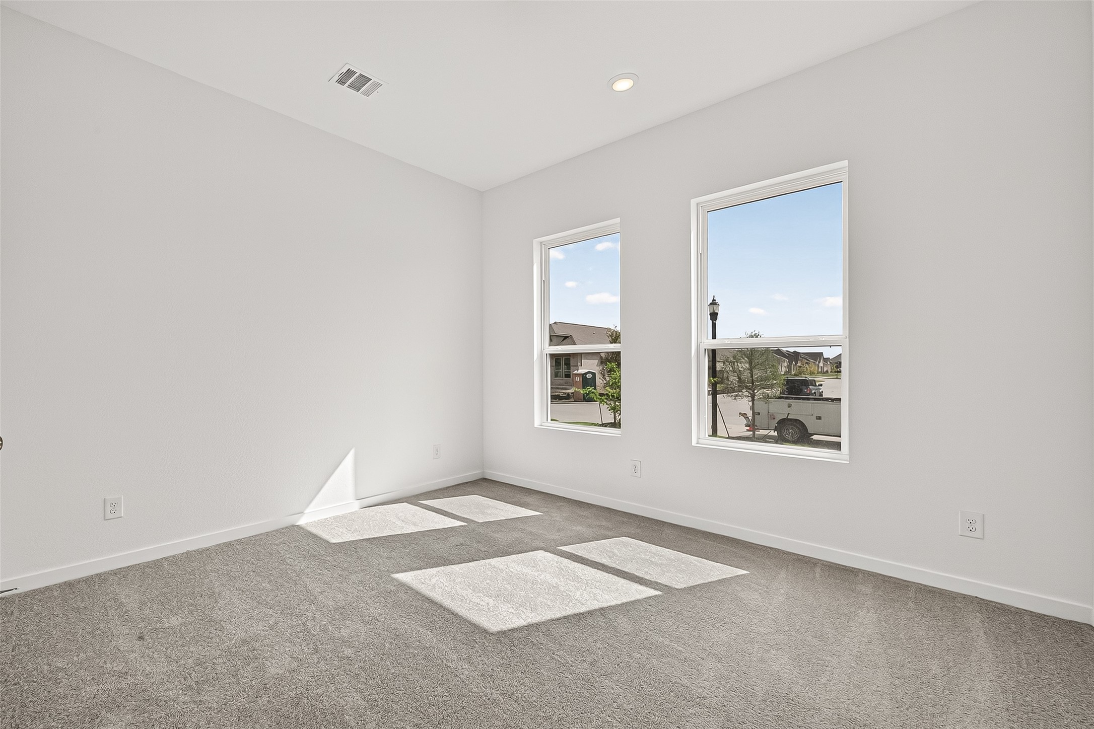 2419 Hazel Berry Street Manvel, TX 77578 - Photo 34 of 50 an empty room with windows