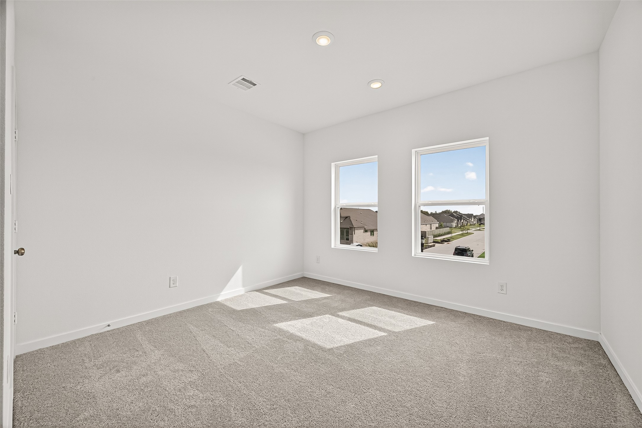 2419 Hazel Berry Street Manvel, TX 77578 - Photo 44 of 50 an empty room with windows