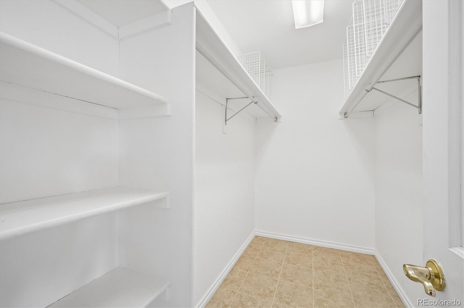 6320 Valley Lane Morrison, CO 80465 - Photo 15 of 28 a view of small space with racks on the wall