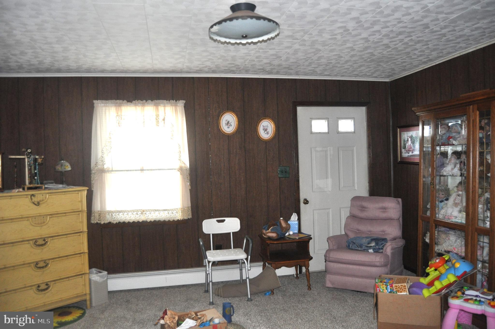 1496 Highway 25 Millersburg, PA 17061 - Photo 11 of 22 a living room with furniture and a window