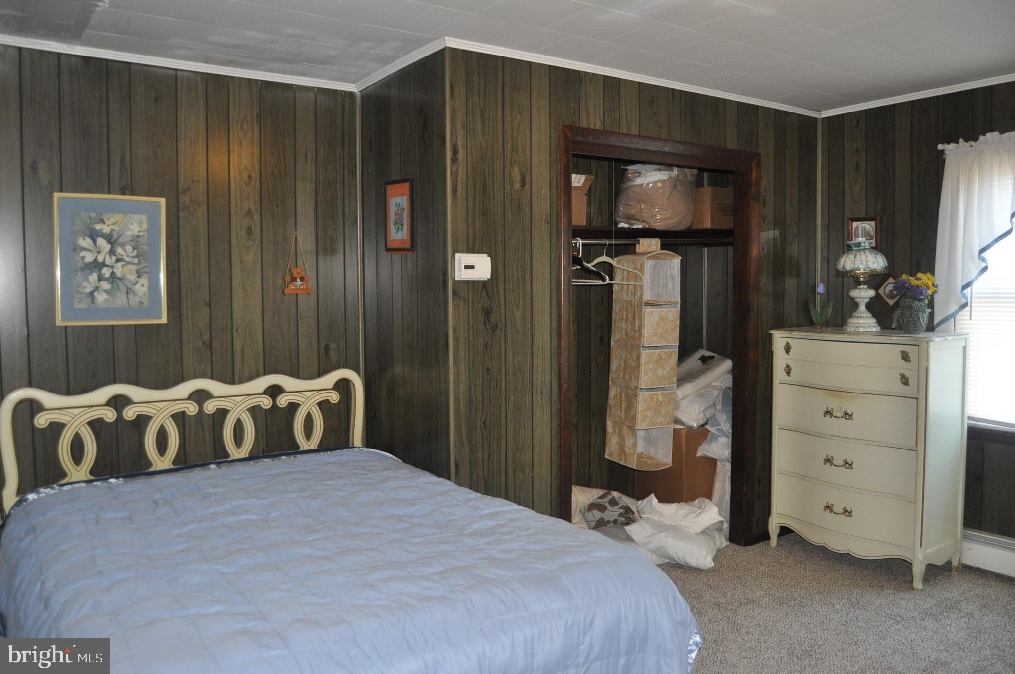 1496 Highway 25 Millersburg, PA 17061 - Photo 13 of 22 a bedroom with a bed and a dresser