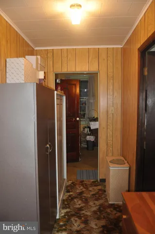 a view of a hallway with windows