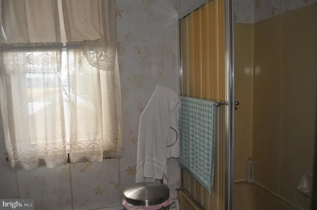 a room with furniture and a window