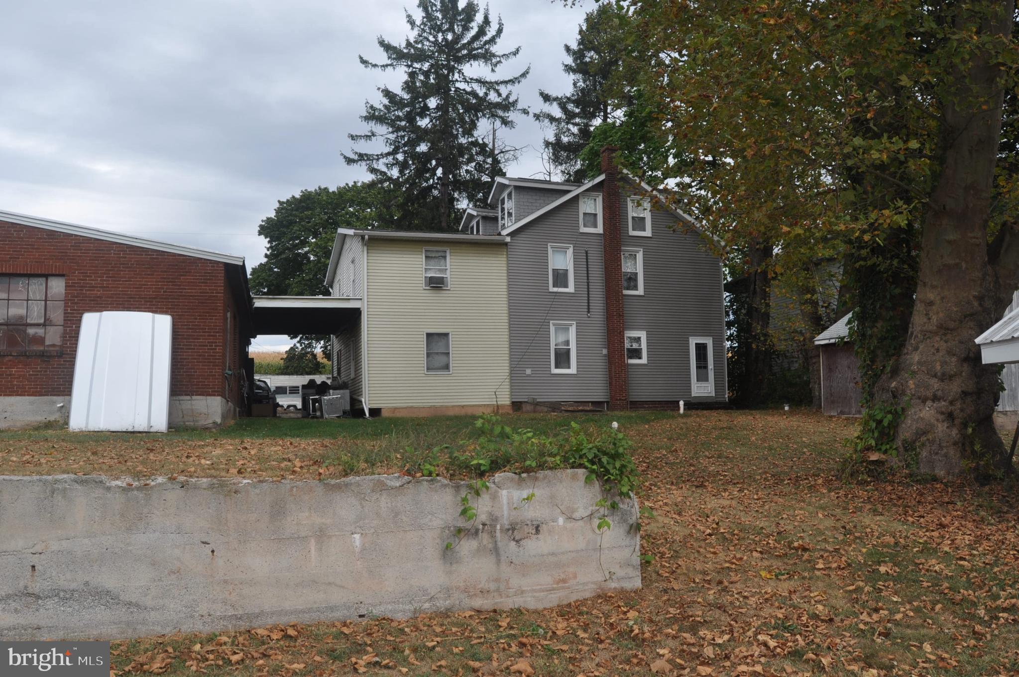 1496 Highway 25 Millersburg, PA 17061 - Photo 21 of 22 a view of a house with a yard and large tree