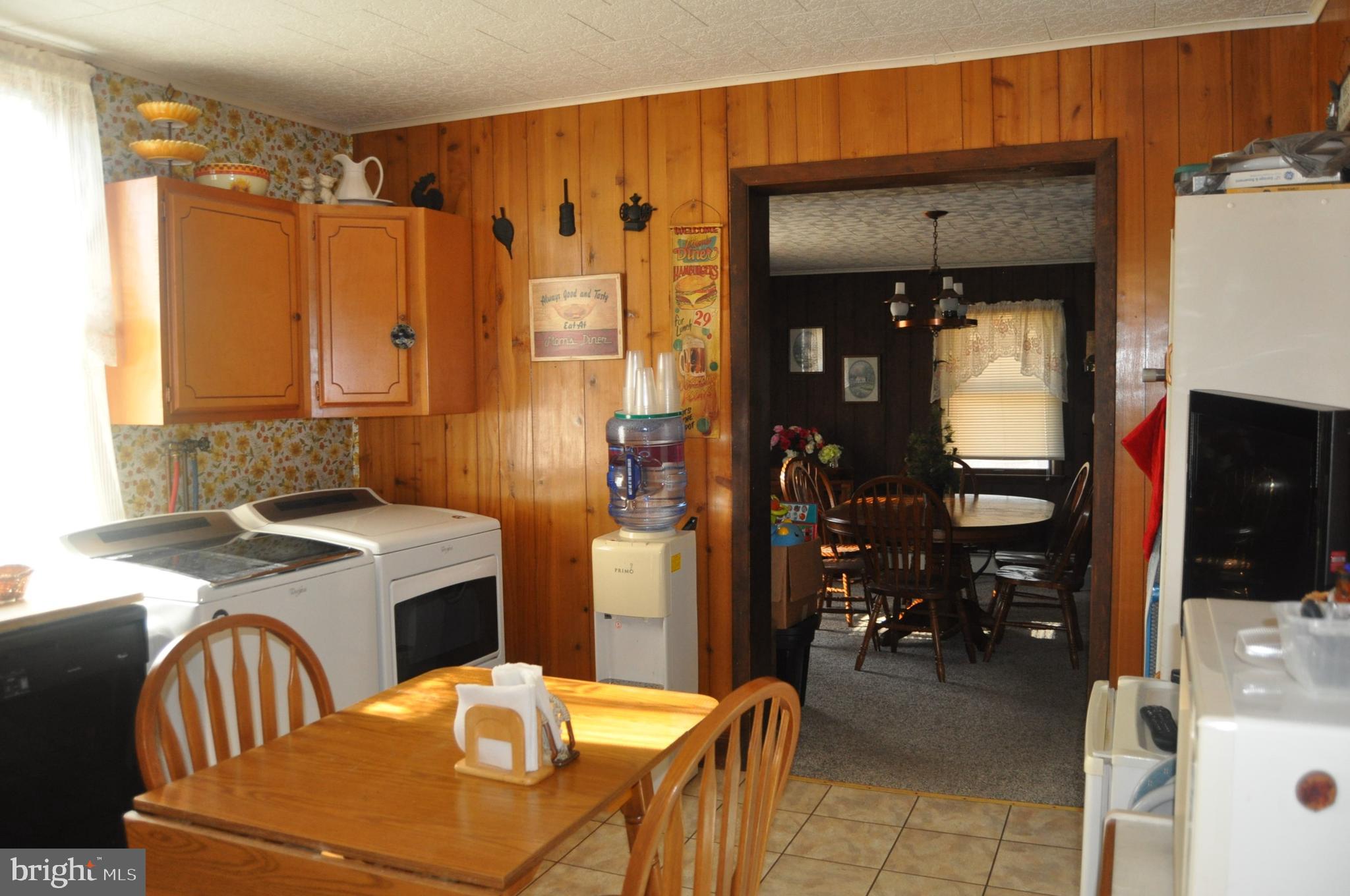 1496 Highway 25 Millersburg, PA 17061 - Photo 7 of 22 a kitchen with a sink a stove and a refrigerator
