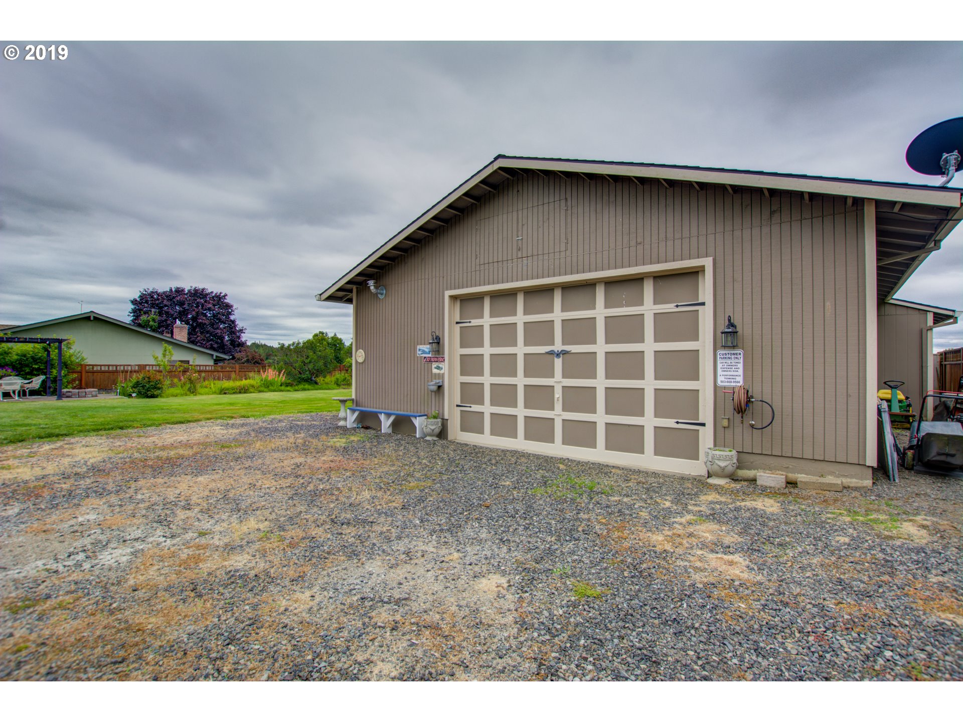 6180 Southeast Lusted Road Gresham, OR 97080 - Photo 20 of 30 a view of a house with a yard and garage