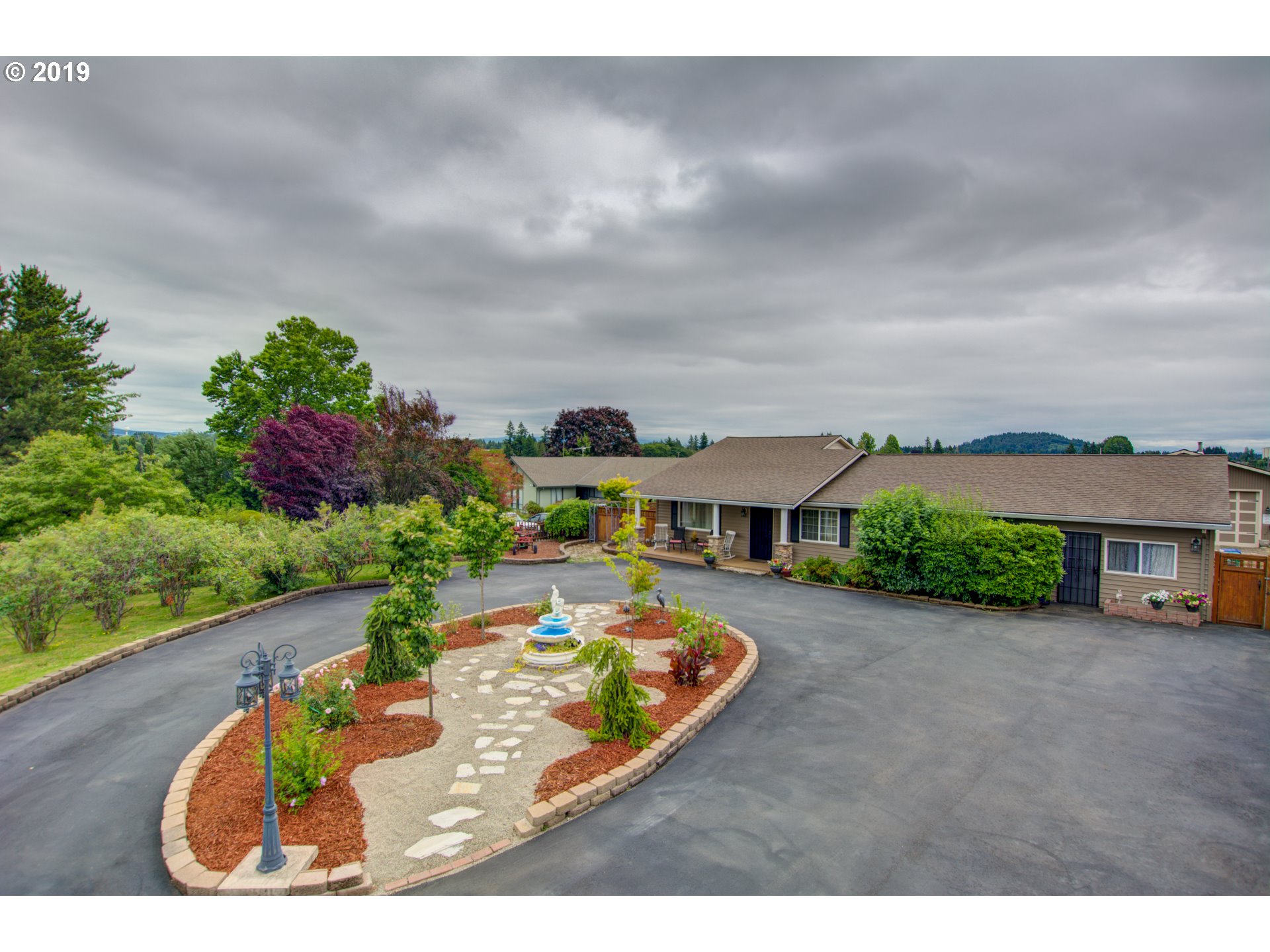 6180 Southeast Lusted Road Gresham, OR 97080 - Photo 2 of 30 a view of a garden with a house