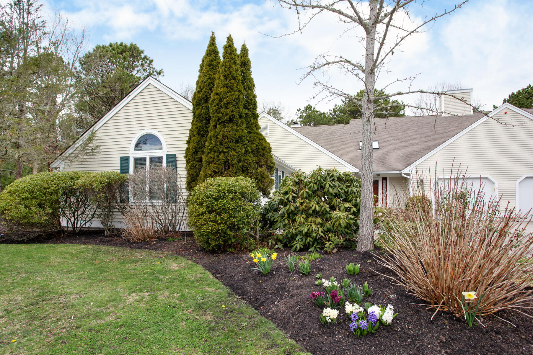 8 Kettle Lane Mashpee, MA 02649 - Photo 1 of 28 a view of a house with a yard