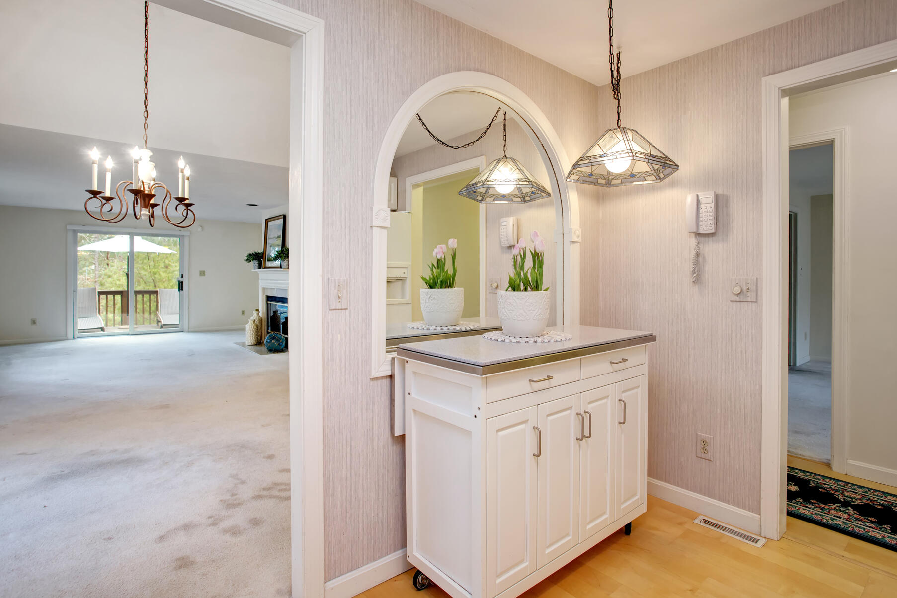 8 Kettle Lane Mashpee, MA 02649 - Photo 12 of 28 a view of a kitchen and a chandelier wooden floor and chandelier