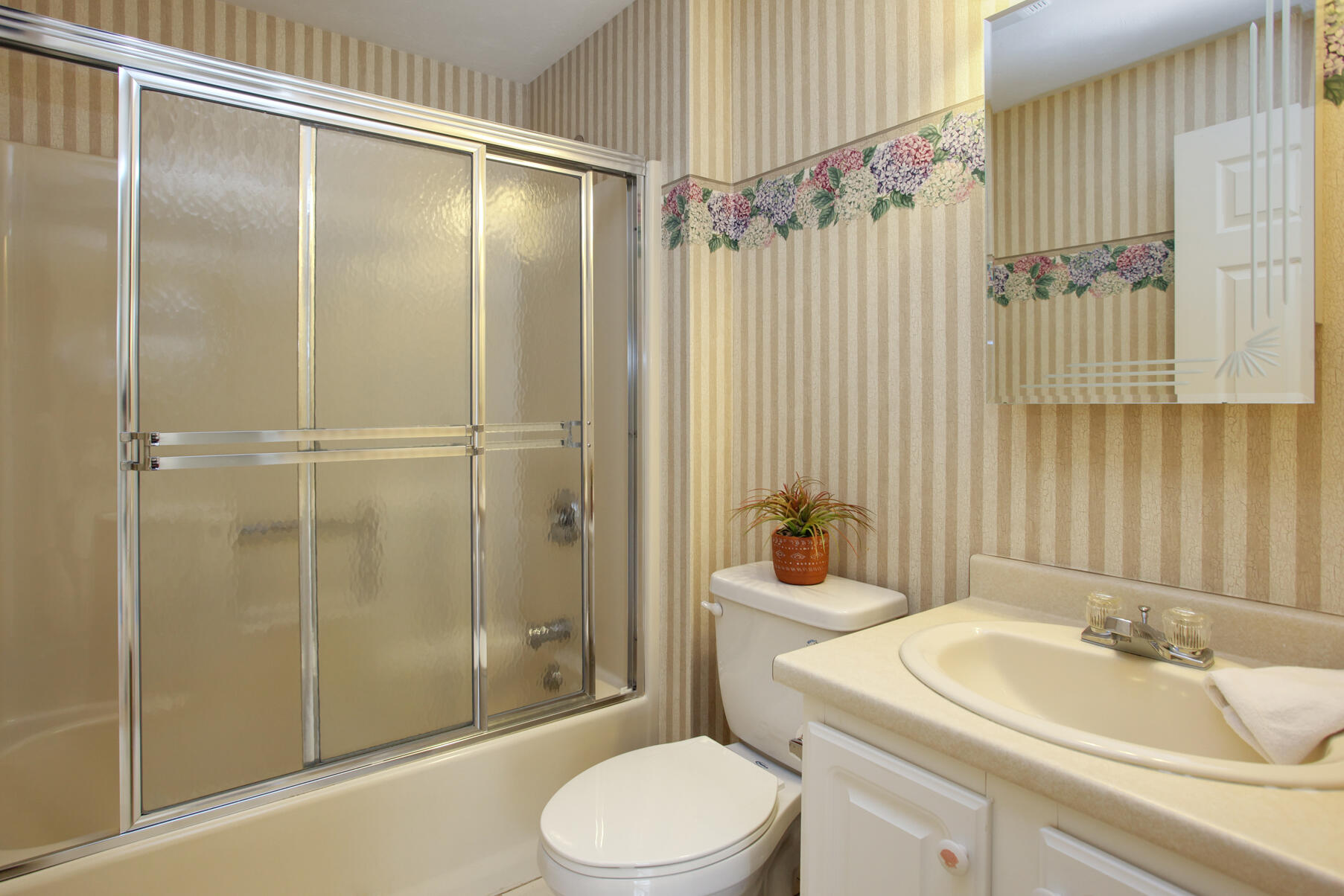 8 Kettle Lane Mashpee, MA 02649 - Photo 19 of 28 a bathroom with a sink toilet and shower