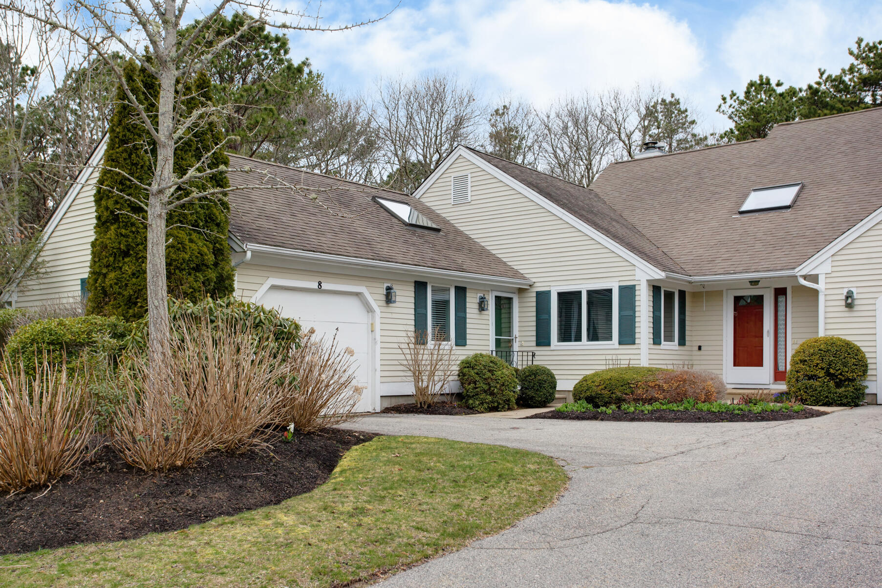 8 Kettle Lane Mashpee, MA 02649 - Photo 2 of 28 a front view of a house with garden