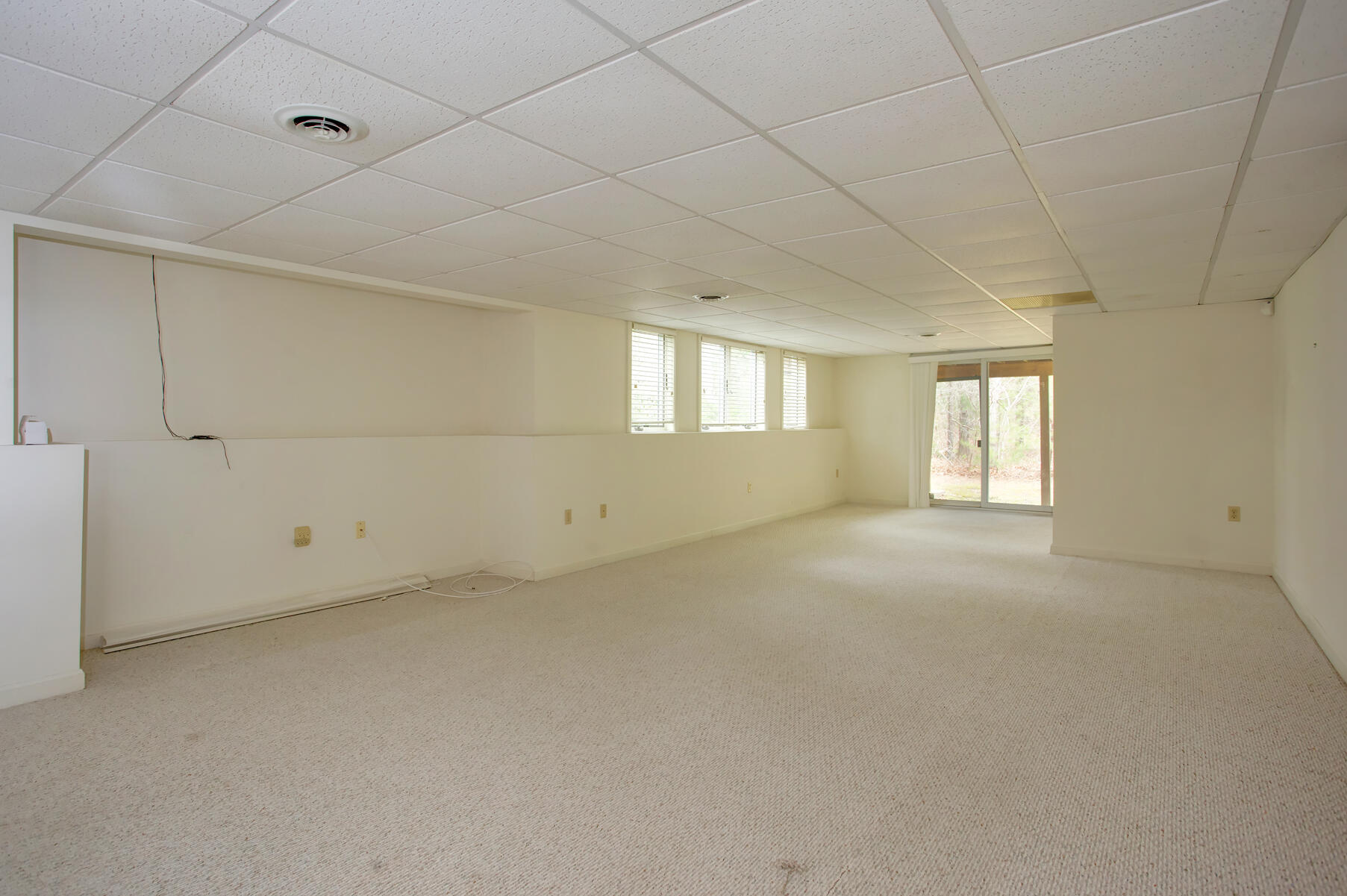 8 Kettle Lane Mashpee, MA 02649 - Photo 21 of 28 a view of an empty room with windows