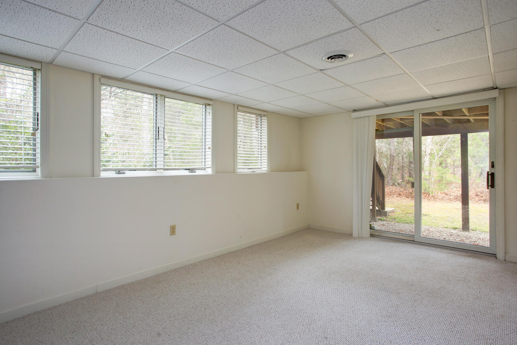 8 Kettle Lane Mashpee, MA 02649 - Photo 23 of 28 an empty room with windows