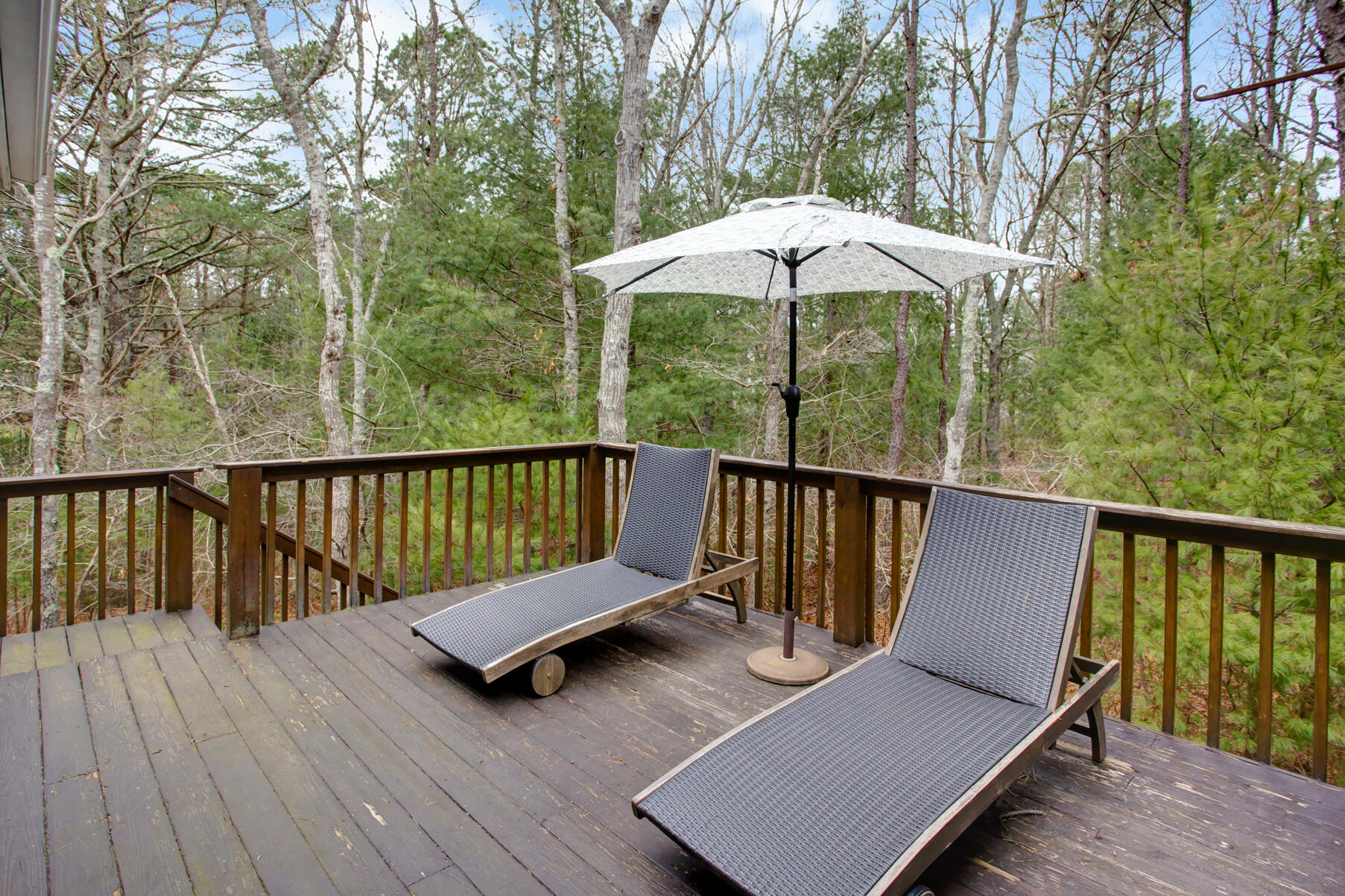 8 Kettle Lane Mashpee, MA 02649 - Photo 27 of 28 a view of a deck with furniture and wooden floor