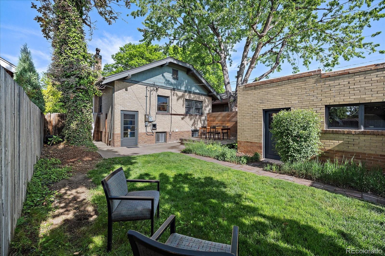 756 Steele Street Denver, CO 80206 - Photo 27 of 32 a house view with a garden space