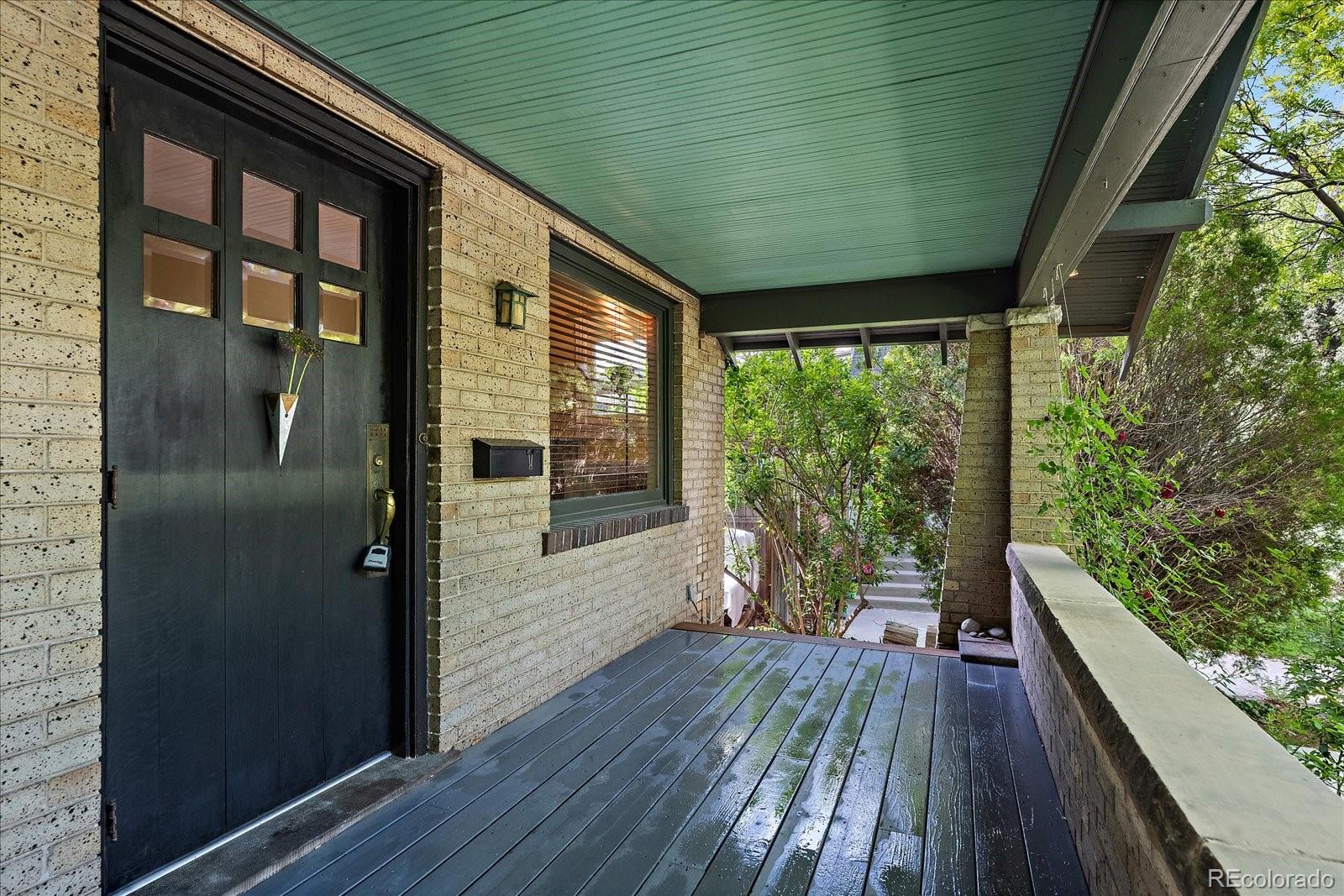 756 Steele Street Denver, CO 80206 - Photo 28 of 32 a house view with balcony