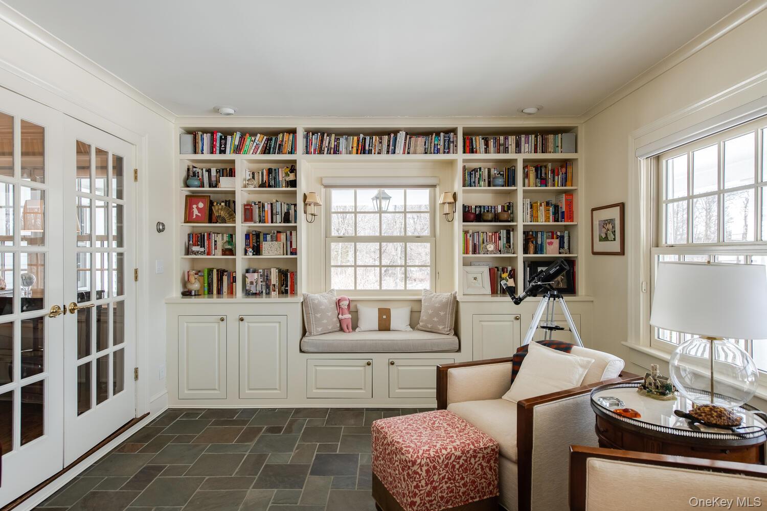 33 Pells Road Rhinebeck, NY 12572 - Photo 21 of 50 a living room with furniture and a book shelf