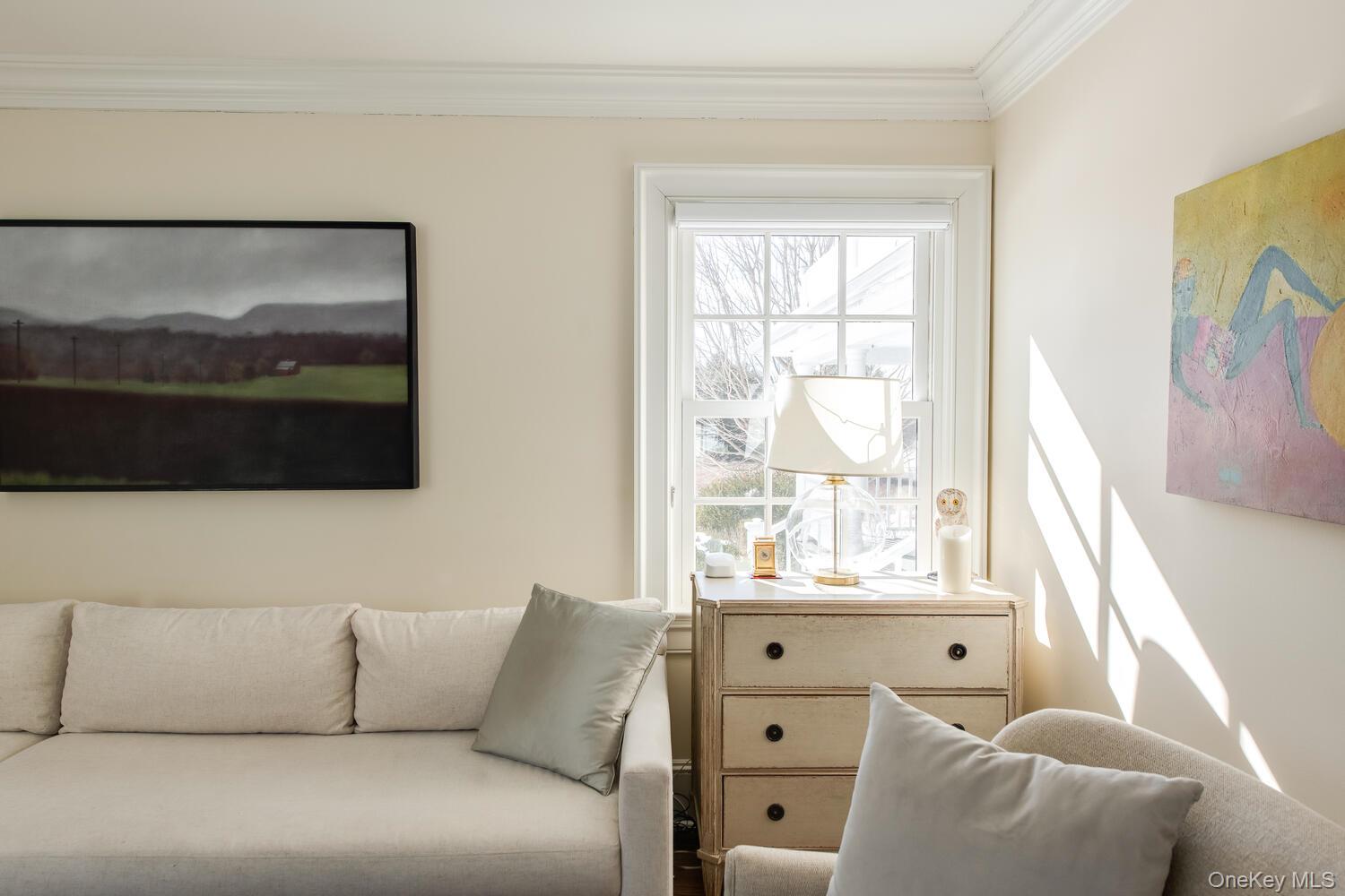 33 Pells Road Rhinebeck, NY 12572 - Photo 24 of 50 a living room with furniture and a flat screen tv