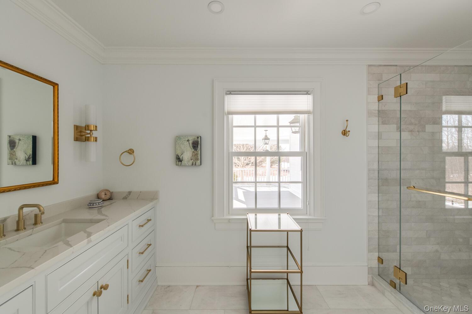 33 Pells Road Rhinebeck, NY 12572 - Photo 25 of 50 a bathroom with a granite countertop sink a mirror and a shower