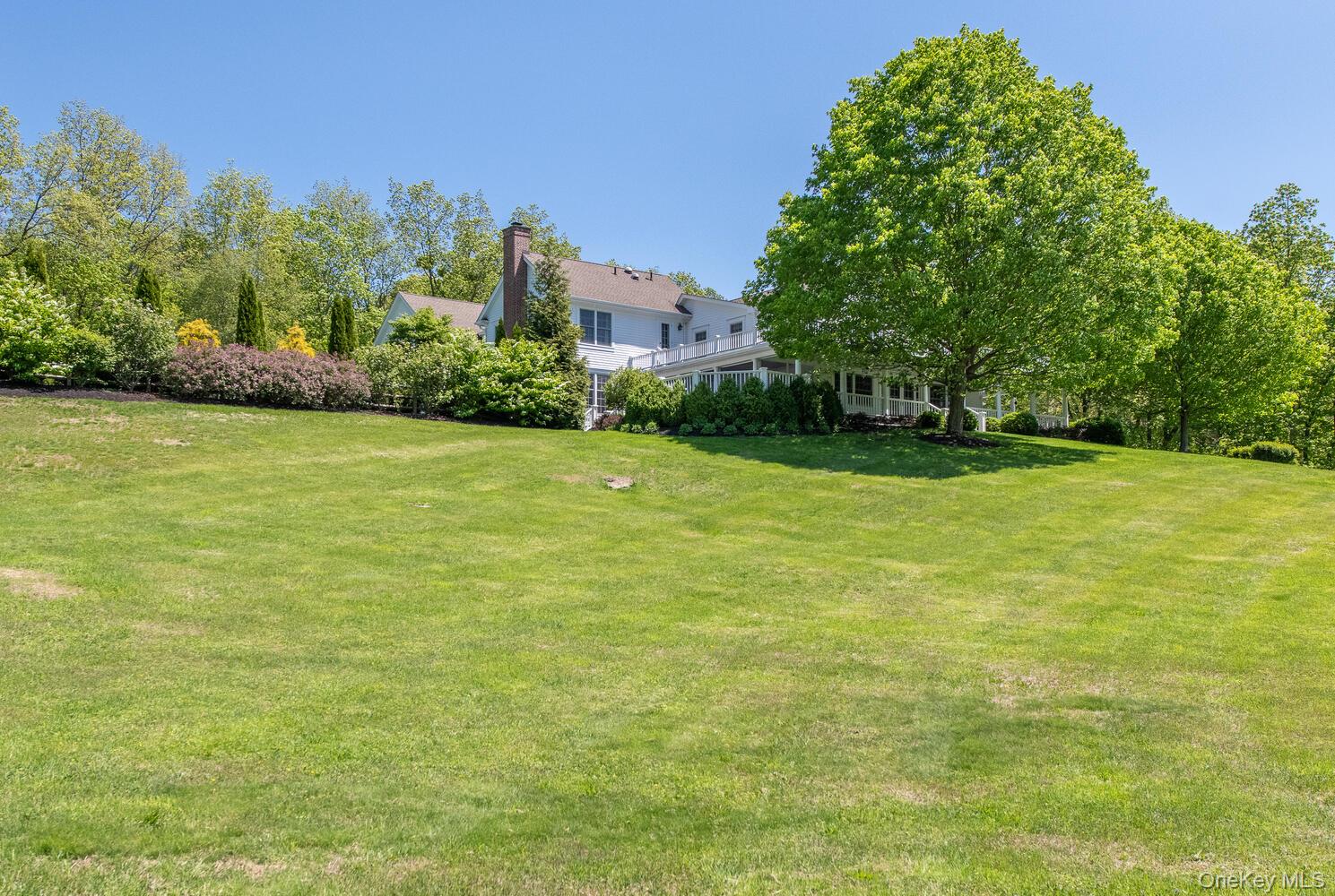 33 Pells Road Rhinebeck, NY 12572 - Photo 3 of 50 a view of a green yard