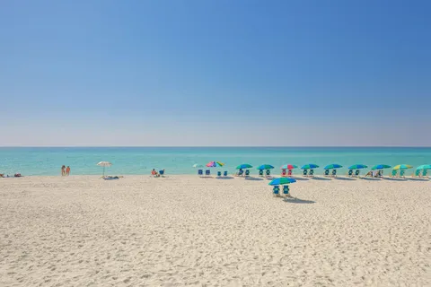 a view of a lake with a beach