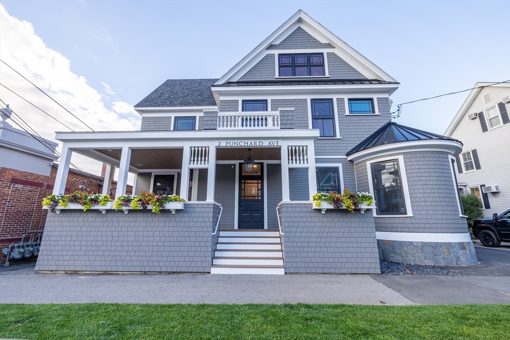 2 Punchard Avenue, Unit 3 Andover, MA 01810 - Photo 2 of 30 a front view of a house with porch and garden