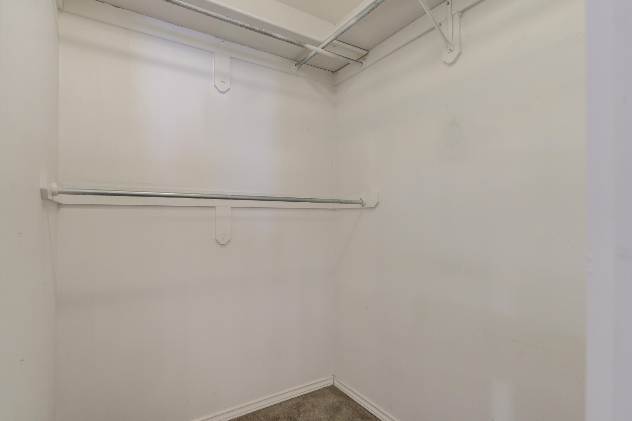 1240 Wheelock Street Lubbock, TX 79403 - Photo 13 of 19 a view of a room with racks on the wall