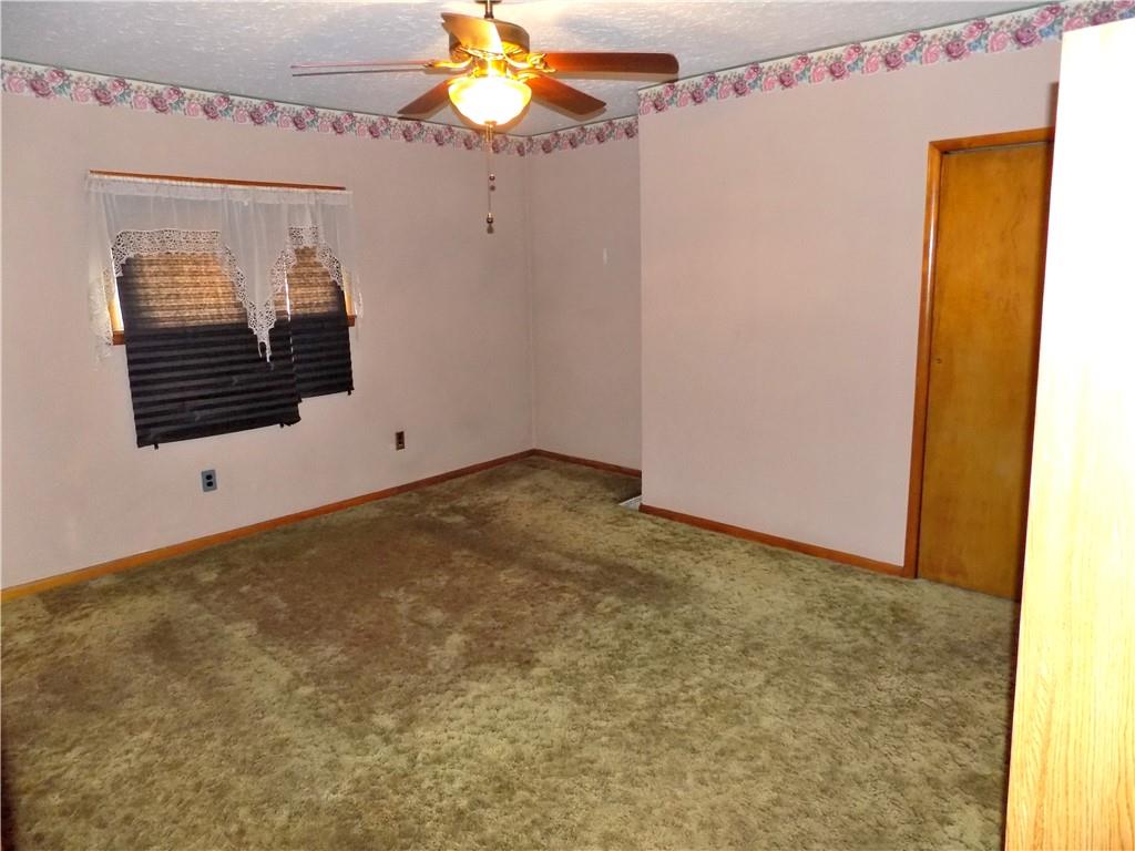 115 Rainey Avenue Uledi, PA 15484 - Photo 14 of 18 a view of an empty room with a window