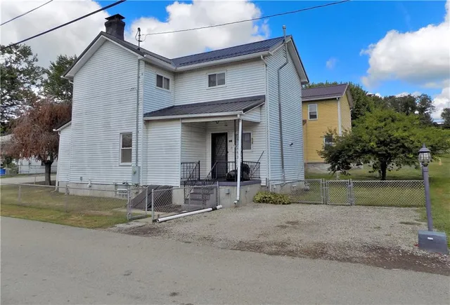 a house view with a outdoor space