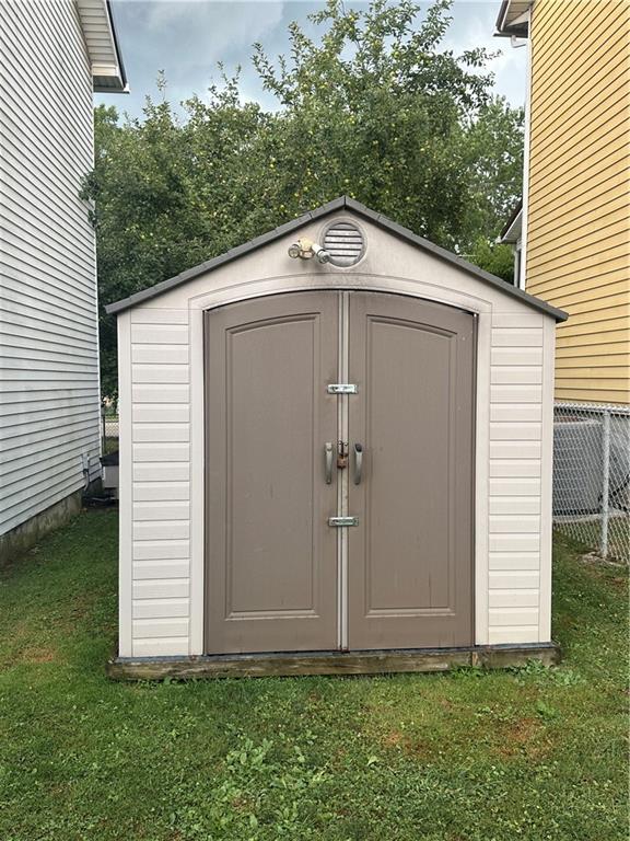 115 Rainey Avenue Uledi, PA 15484 - Photo 4 of 18 a front view of house with garden