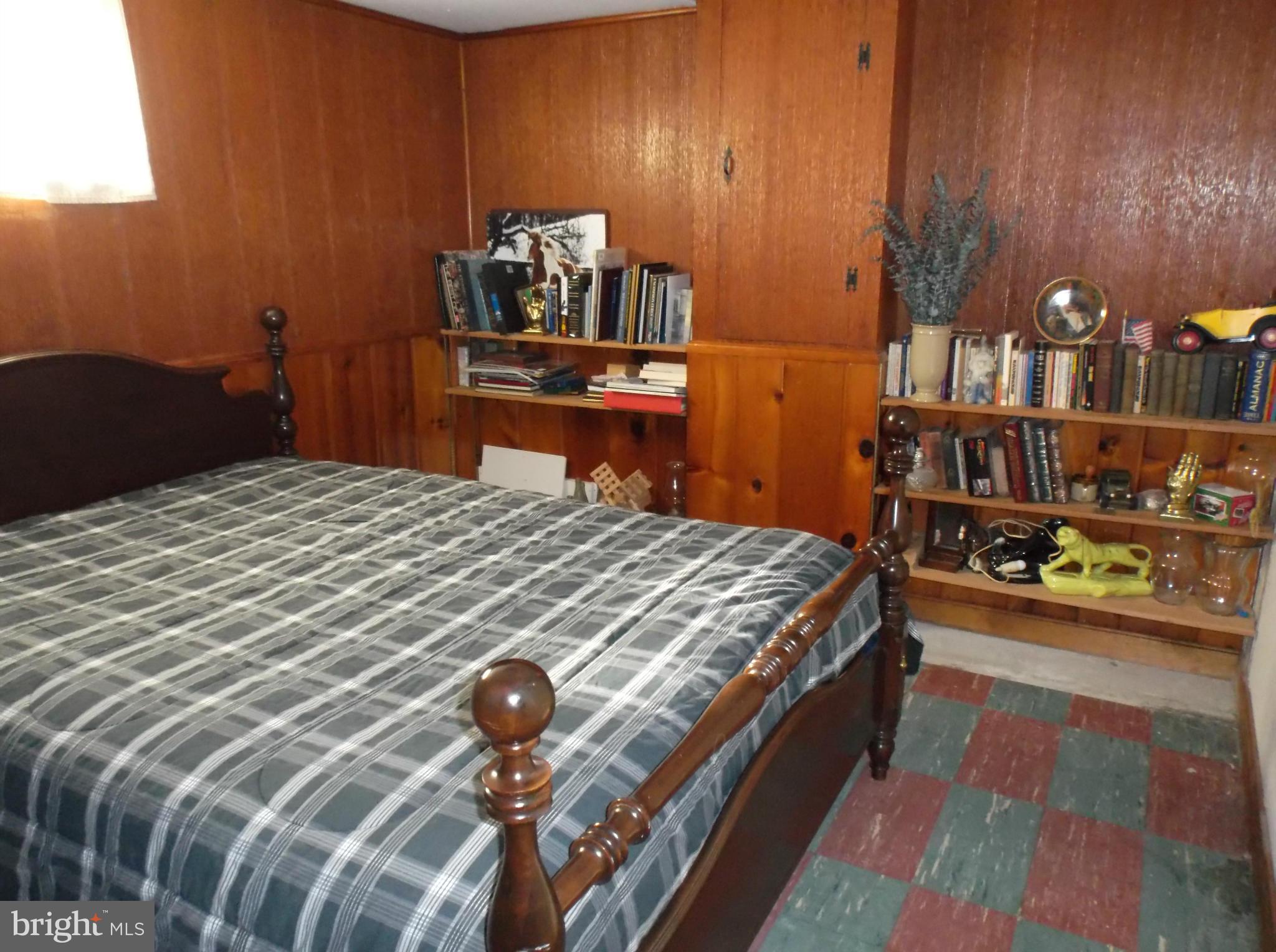 12109 Foley Street Silver Spring, MD 20902 - Photo 21 of 26 Basement with wood paneling