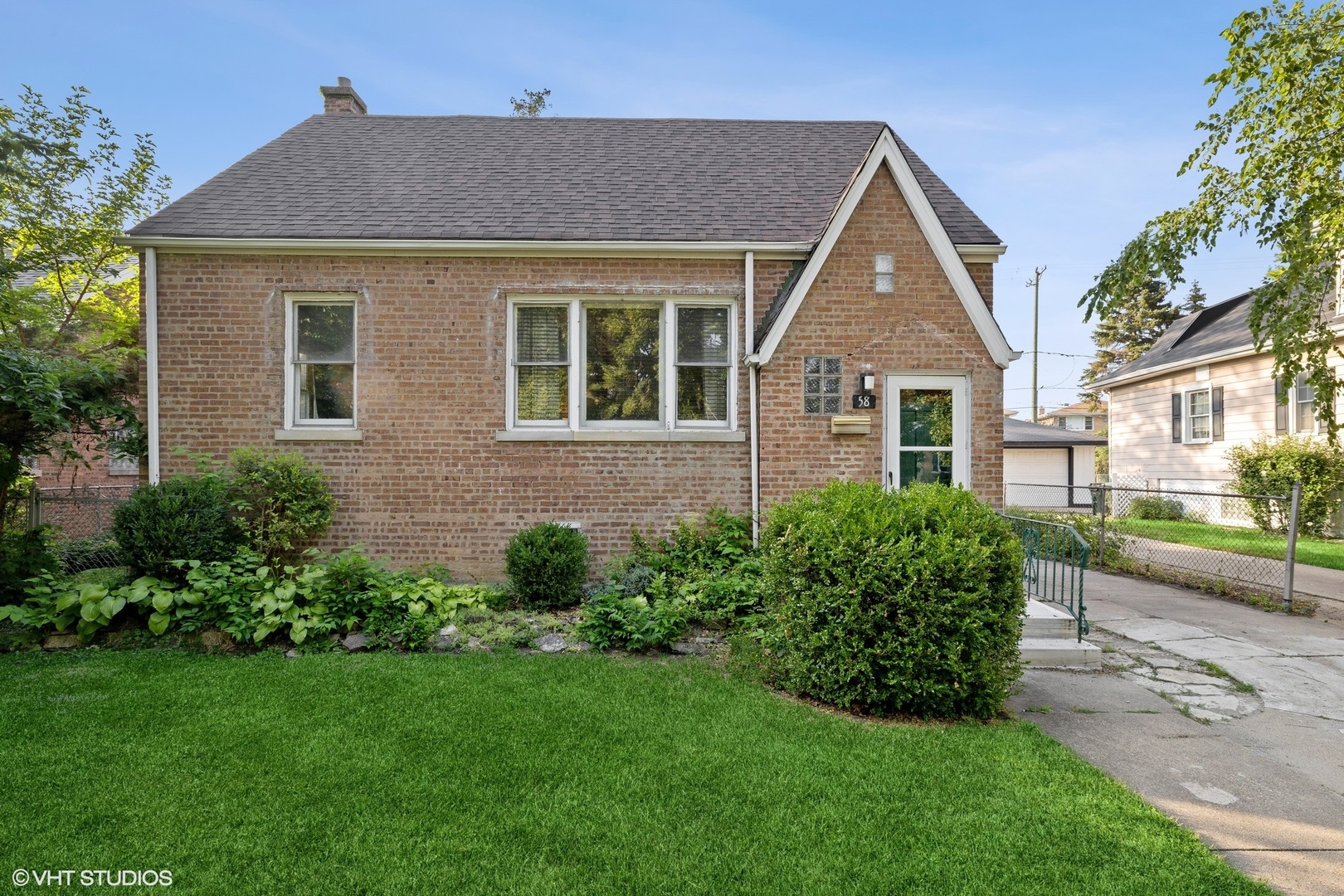 58 Northgate Road Riverside, IL 60546 - Photo 1 of 7 a front view of a house with a yard