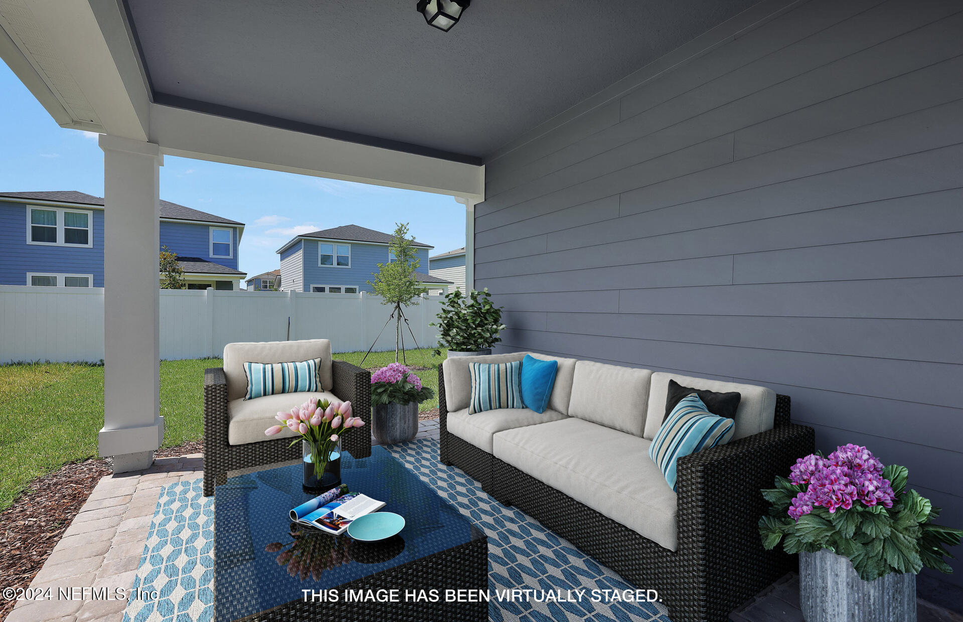 152 Flintlock Lane St. Augustine, FL 32095 - Photo 22 of 40 a living room with furniture and a rug