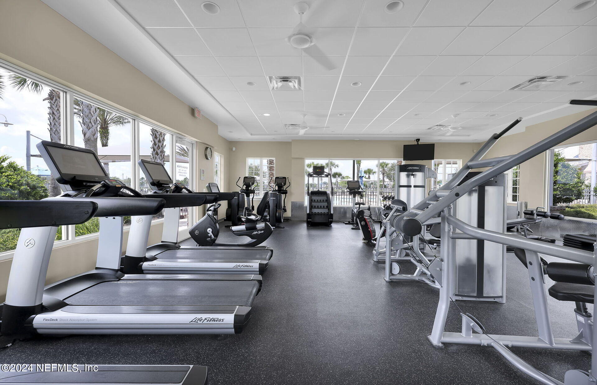 152 Flintlock Lane St. Augustine, FL 32095 - Photo 26 of 40 a view of a room with gym equipment
